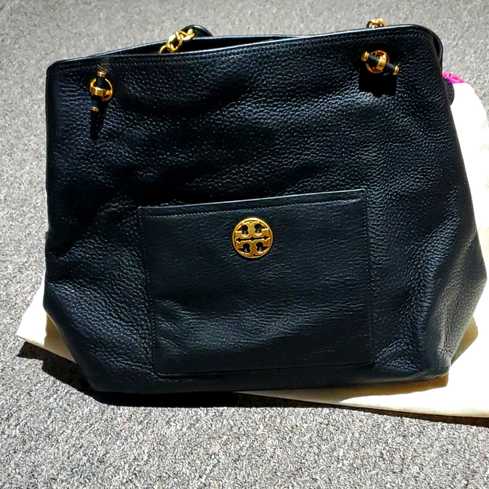 Tory Burch Black leather purse.